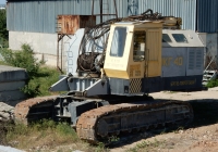 Кран МКГ-40 Зав. №210 в транспортном положении. Севастополь, АО "Стальмонтаж"