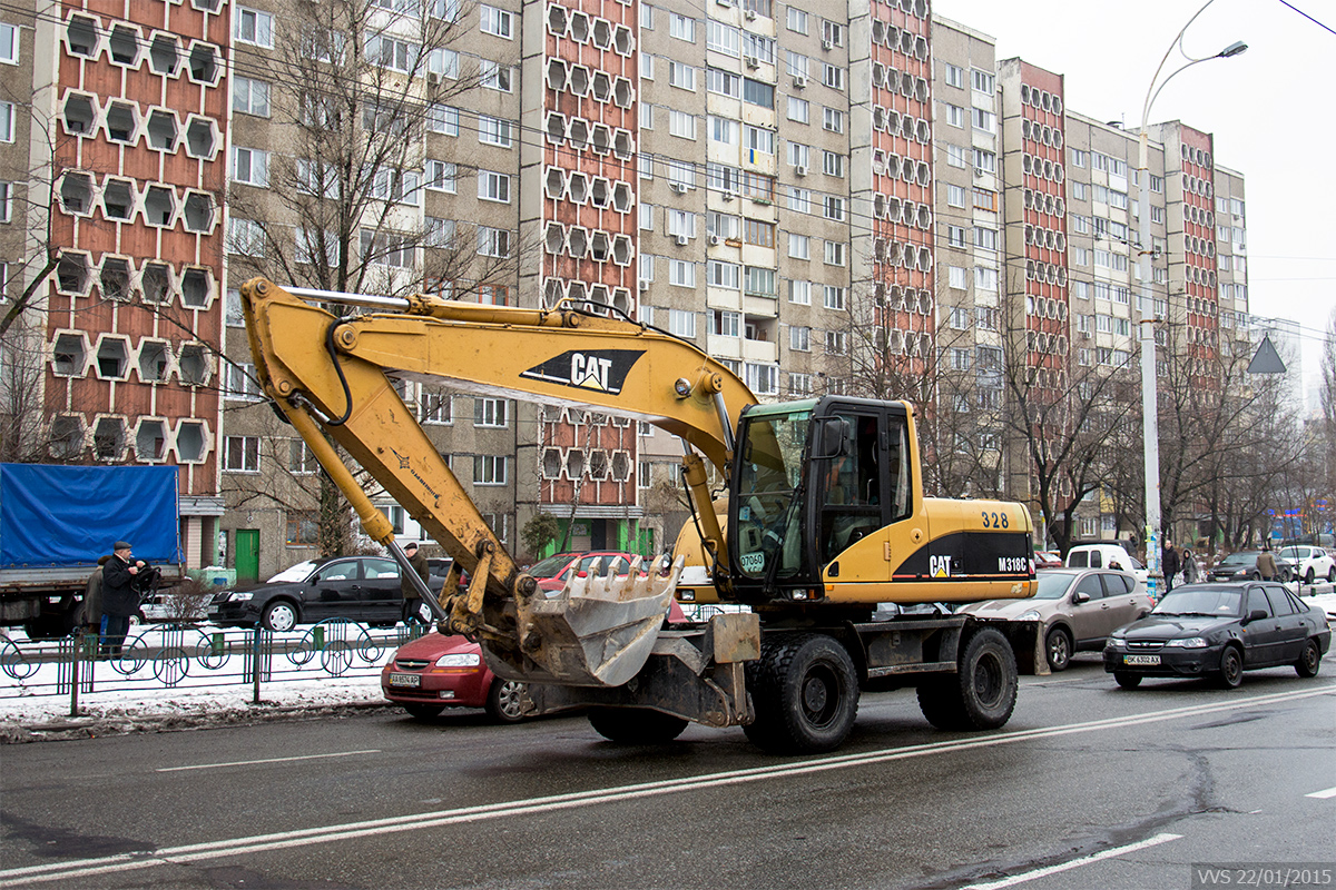 Экскаватор Caterpillar M318С #07060 КС. Киев, улица Героев Днепра