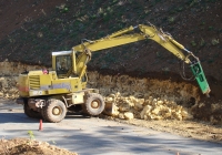 Экскаватор Case 688B с гидромолотом. Севастополь