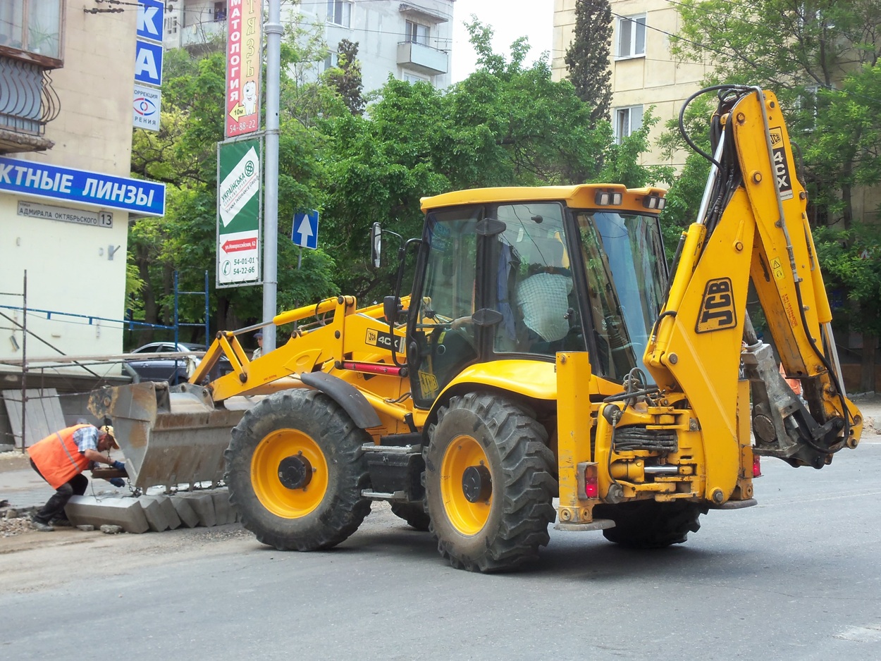 Экскаватор-погрузчик JCB 4CX #Т 5052 КМ. Севастополь