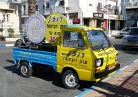 Минигрузовик Subaru Sambar, #27-947-54 с рекламой страховой компании . Израиль, Нагария 