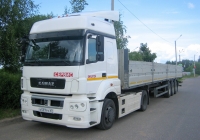 Седельный тягач КамАЗ-5490 #Х 597 РС 69 с бортовым полуприцепом. Россия, Тверская область, Удомля, Автодорожная улица
