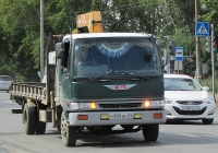 Автомобиль Hino Ranger с гидроманипулятором #Х 808 ВН 54. Новосибирск, улица Одоевского