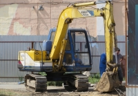 Экскаватор Kobelco Yutani SK*. Курган, Пролетарская улица