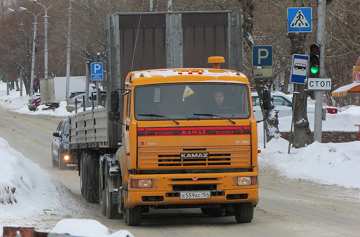 Седельный тягач КамАЗ-65116 #Е 559 АС 154 с полуприцепом. Новосибирск, улица Добролюбова