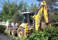 Экскаватор-погрузчик New Holland B115 #7466 ХК 86. Тюмень, Ямская улица