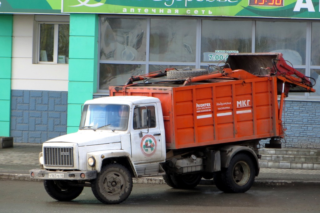 Мусоровоз МКГ на шасси ГАЗ-3307 #Х 965 РВ 66. Свердловская область, Нижний Тагил, Уральский проспект