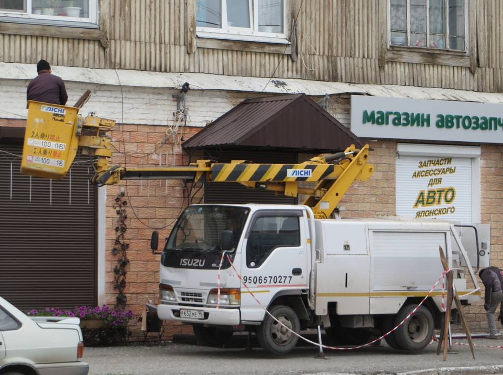 Автоподъёмник Aichi на шасси Isuzu ELF #Р 652 МЕ 96. Курган, улица Куйбышева