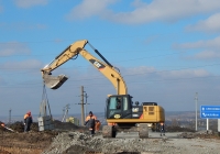 Экскаватор Caterpillar 320DL. Белгородская область, Алексеевский район, автодорога Р-185 "Белгород - Павловск"