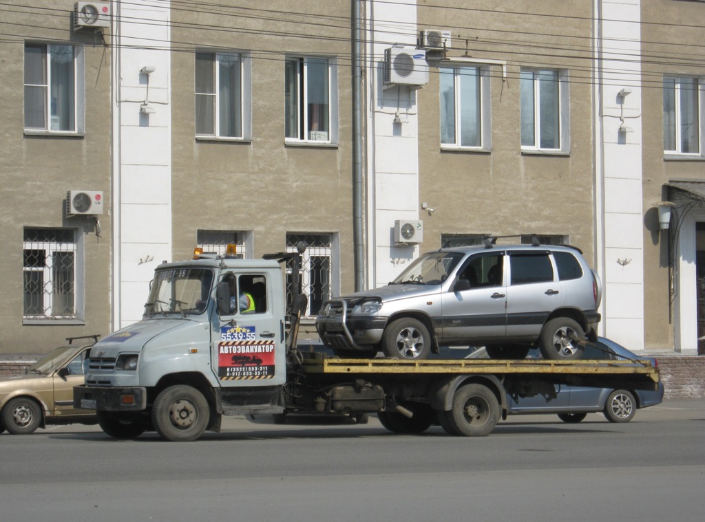 Эвакуатор на шасси ЗиЛ-5301* . Курган, улица Куйбышева