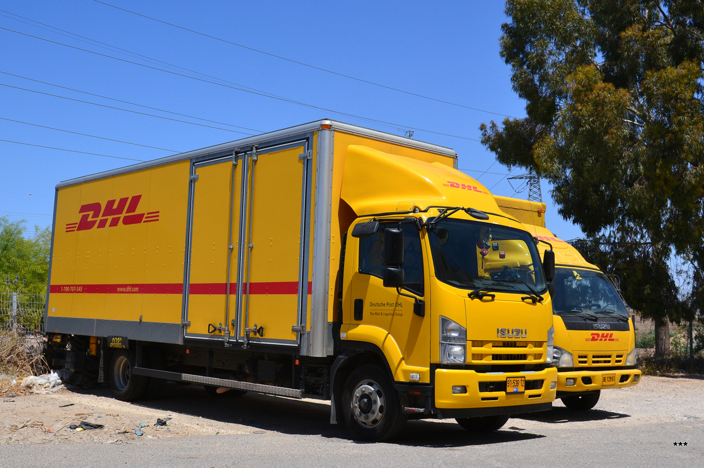 Фургон компании DHL на шасси Isuzu #91-536-12 . Израиль, Хайфа
