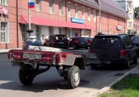 Прицеп КМЗ-8136 #АС 5326 72 в составе автопоезда. Тюмень, улица Луначарского