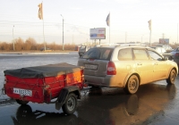 Прицеп Уралтрансмаш-8236 #АУ 0023 72 в составе автопоезда. Тюмень, Алебашевская улица