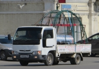Бортовой грузовик Nissan Atlas #X 444 BX 45.  Курган, улица Куйбышева 