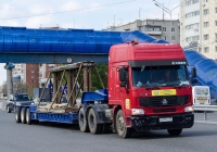 Седельный тягач CNHTC Howo ZZ4257 #М 431 УС 72 с полуприцепом для перевозки спецтехники #АТ 5346 72  . Тюмень, улица Федюнинского