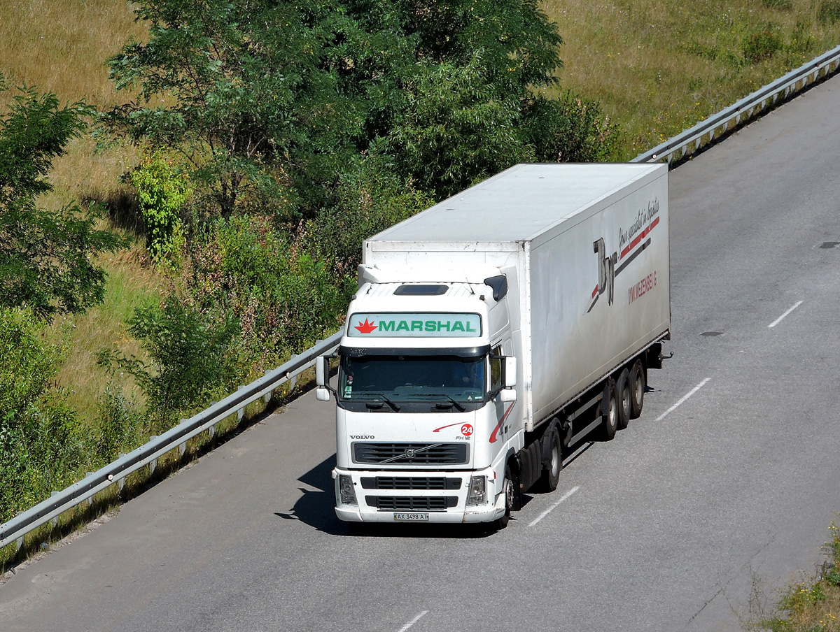 Седельный тягач  Volvo FH 12 #АХ 3498 АТ. Харьковская область, трасса М-29
