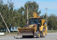 Экскаватор-погрузчик Caterpilar # 9170 ЕЕ 31. Белгородская область, г. Алексеевка, ул. Павла Ющенко