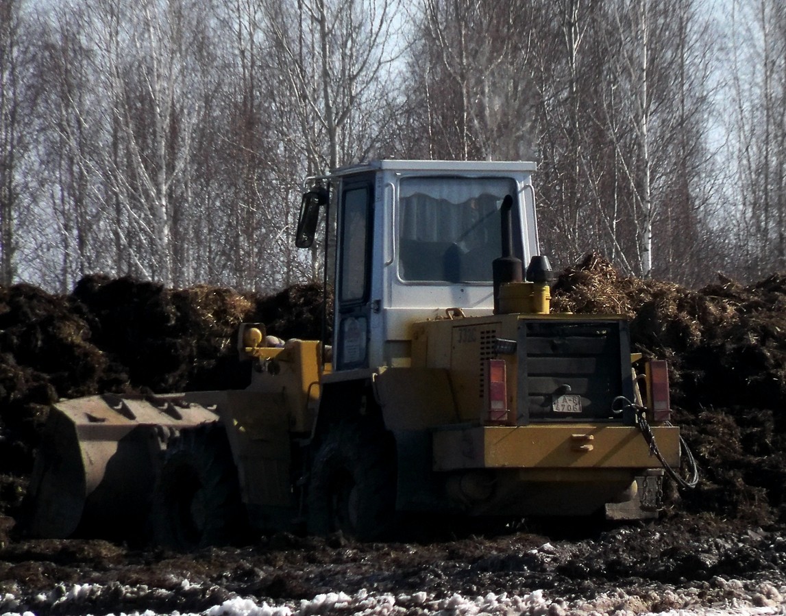 Погрузка органических удобрений фронтальным погрузчиком Амкодор-332С #ТА-6 4706. Беларусь, Могилёвская область, Хотимский район