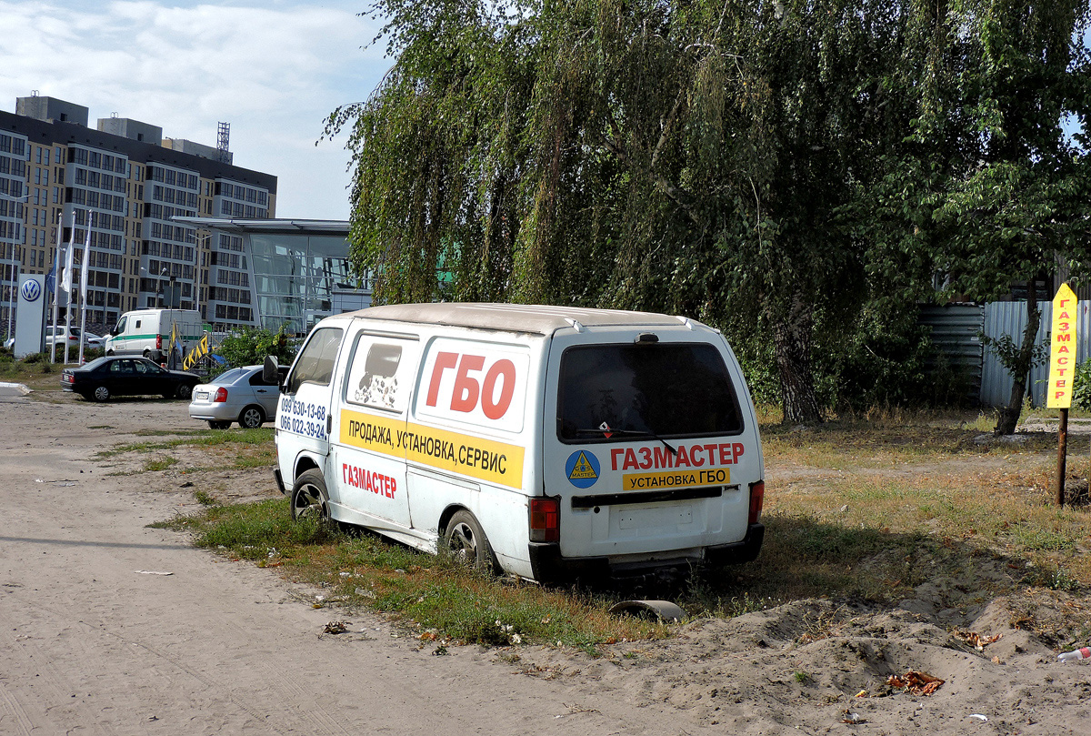 Фургон Isuzu Midi, используемый в качестве рекламы  #BI 9535 AE. Харьковская область, г. Харьков, Клочковская улица