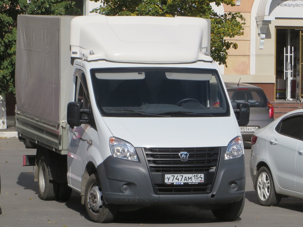 Бортовой автомобиль ГАЗ-A21R22 "Газель Next" #У 747 АМ 154. Курган, улица Гоголя