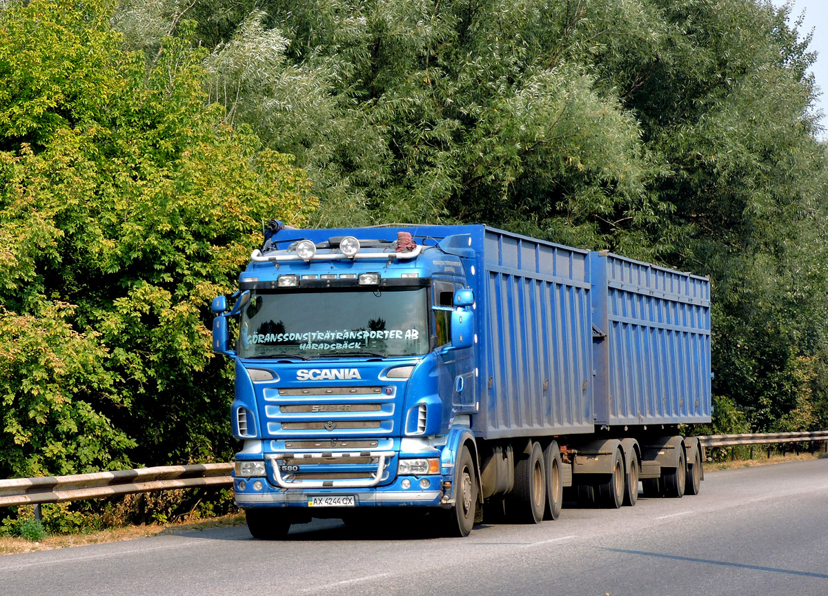 Бортовой грузовик  Scania R580 #АХ 4244 СХ. Харьковская область, г. Чугуев, автотрасса М-03