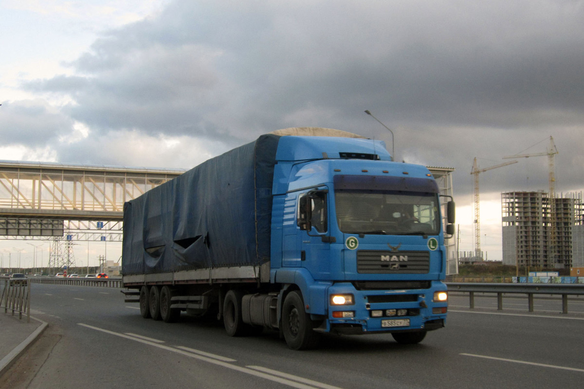 Седельный тягач MAN TGA 18.410 #В 585 СУ 77 с полуприцепом. Тюмень, улица Федюнинского 