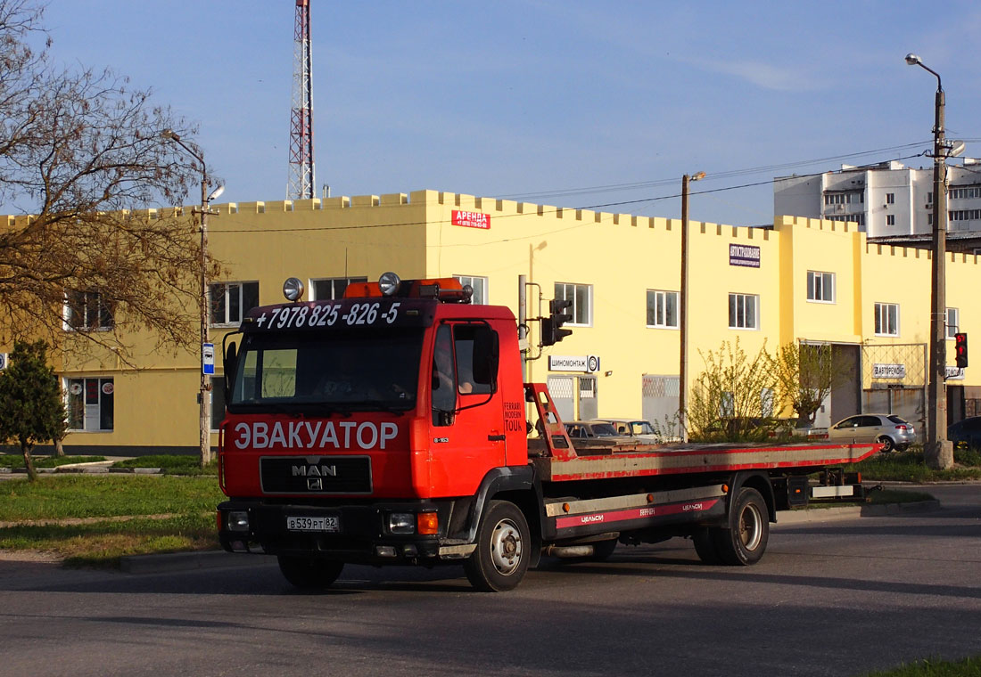 Эвакуатор на шасси MAN L2000, # В 539 РТ 82. Крым, Евпатория, улица Дмитрия Ульянова