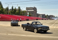 Церимониальный автомобиль на базе легкового автомобиля ГАЗ-3201 "Волга". Всего силами гаража штаба 8-й общевойсковой армии (ранее - штаба ПривВО) построено было две машины. Автомобили используются при проведении парада в честь годовщины Победы в Великой Отечественной Войне. Автомобили имеют регистрационные номера 1941АЕ76 и 1945АЕ76. Автомобили отсняты во время репетиций парадов 2018 и 2020 годов.. г. Самара, пл. им. В. В. Куйбышева